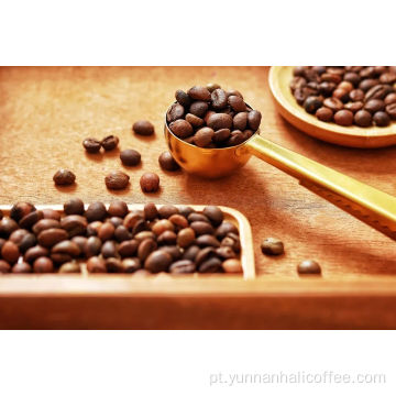 Feijões de café ensolarados e doces